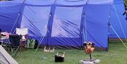tent showing fire pit that is supplied
