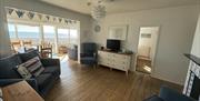 Seaspray Pagham's comfortable living area and sea view