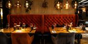 interior of terra restaurant with booth seating and laid tables for group dining, celebrations, anniversaries, birthdays, sunday lunch and corporate d
