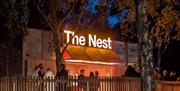Outside view of The Nest outlet in the evening