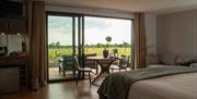 lodge view of bedroom from inside looking out
