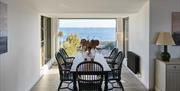 Dining room with coastal view