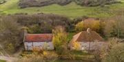 skylark and redshank cottages viewed from above nestling in the downs