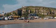 hastings seafront with the cliffs and iconic fishermans huts