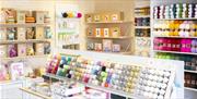 We are a vibrant craft shop packed with modern supplies, unique kits from UK makers, and original patterns. Join our weekly workshops for all ages, fr